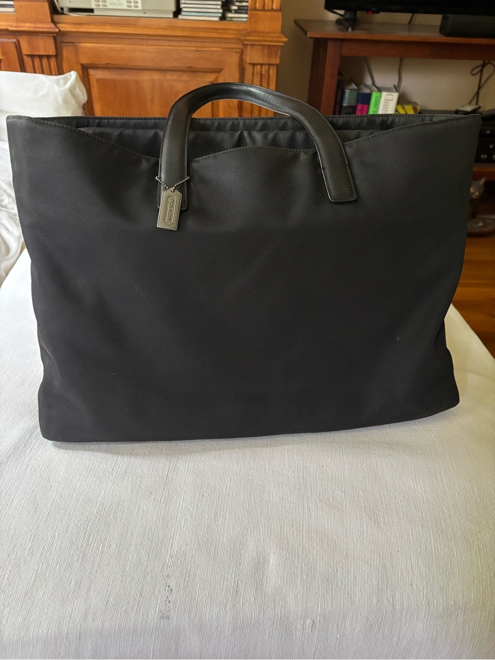 Coach Classic Women’s Laptop/Black Canvas Tote with Smooth Leather Handles.